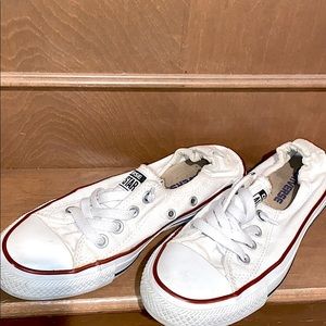 White Converse low top elastic slip on sneakers